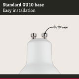 Close-up of white lamp with standard metal GU10 base for easy installation and lighting