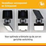 Verstelbaar zwart zonnepaneel en lichtpaneel met bewegingssensor voor optimale zonoriëntatie en gerichte verlichting