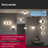 Gove series bathroom lights with spherical white glass shades and black metal in coordinated modern design