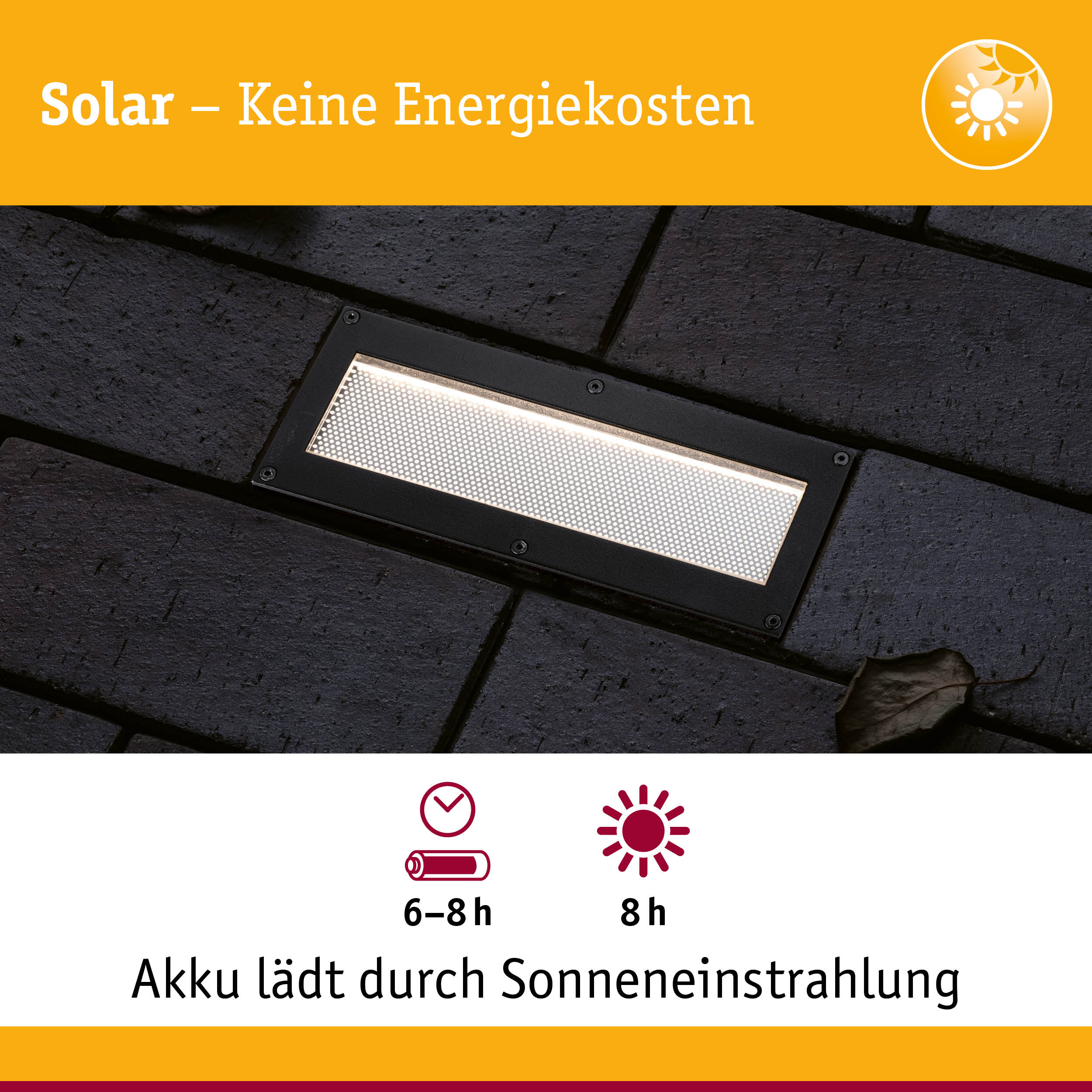 Schwarze Solar-LED-Außenleuchte in Bodenmontage mit energiesparender Beleuchtung auf dunklem Pflaster