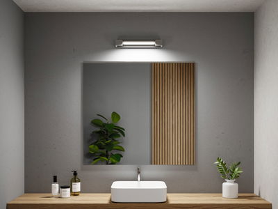 Modernes Badezimmer mit rechteckigem weißen Waschbecken auf Holzplatte und LED-Spiegelleuchte