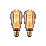 Two decorative LED bulbs with amber glass and gold base for warm ambient lighting in home or office