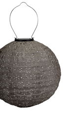 Round grey paper lantern with floral cutouts and metal handle for hanging, decorative lighting