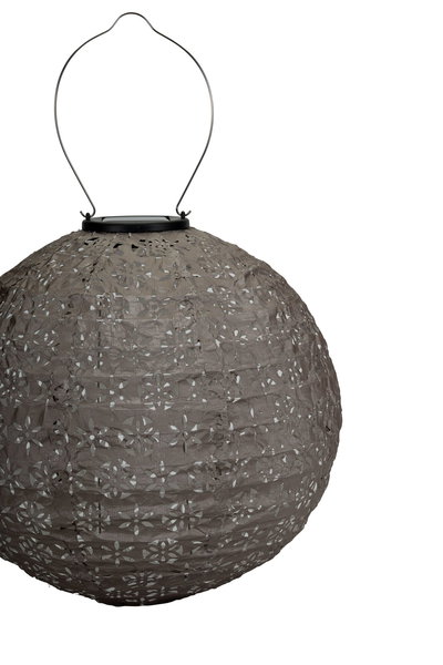 Round grey paper lantern with floral cutouts and metal handle for hanging, decorative lighting