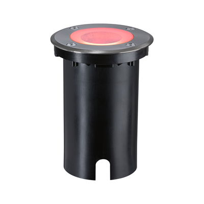 Spot encastré au sol rond en métal noir avec lumière LED rouge pour éclairage extérieur