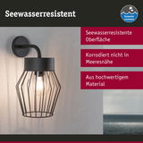 Schwarze Wandlampe aus Metall mit seewasserresistenter Oberfläche, korrosionsfrei für Außenbereiche.