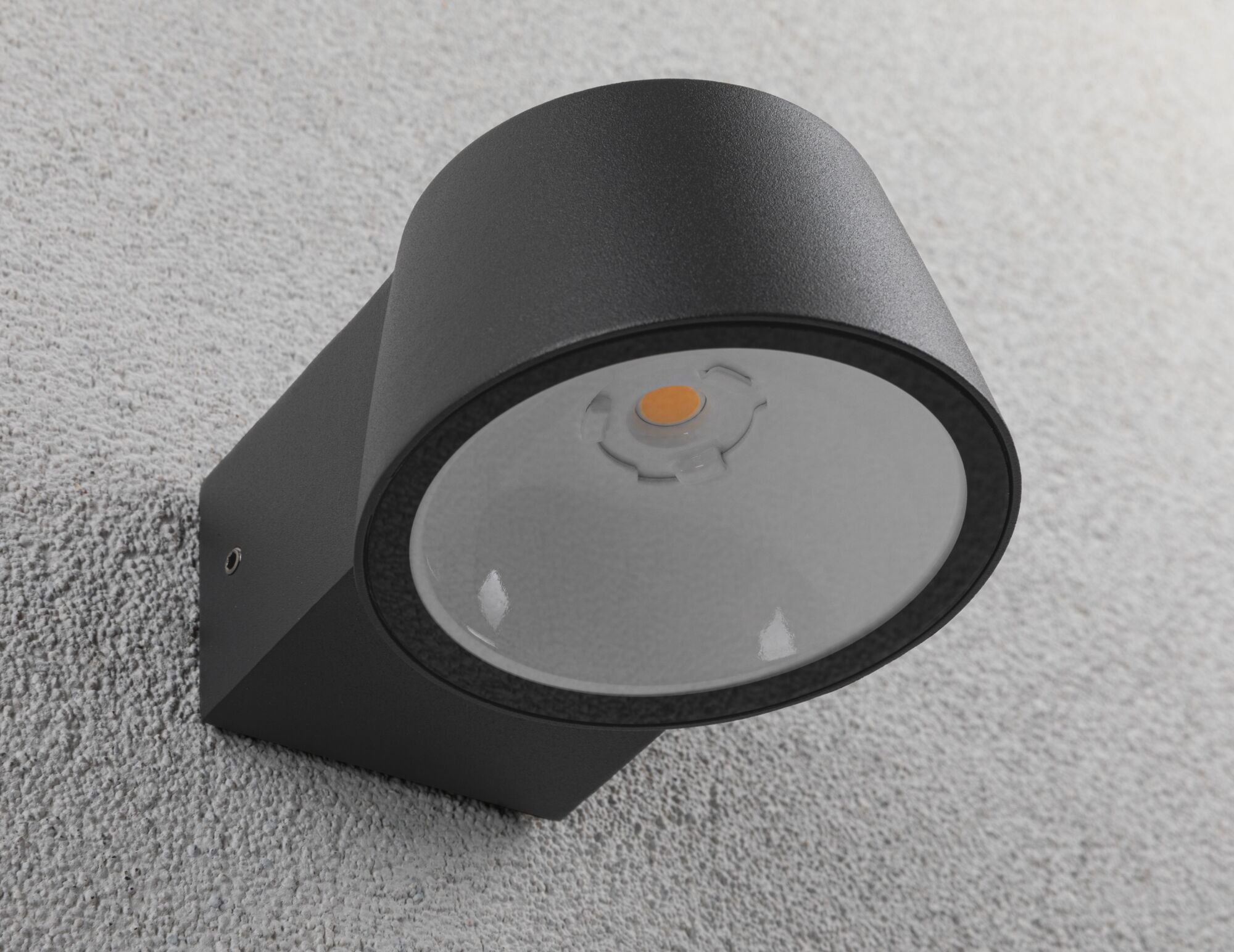 Sort metal LED-udendørsvæglampe med rundt design til moderne boligbelysning