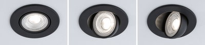 Drei schwarze Einbaustrahler aus Metall mit verstellbarem LED-Licht in Decke montiert