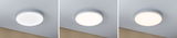 Three white round LED ceiling lights with adjustable brightness in a modern room setting.