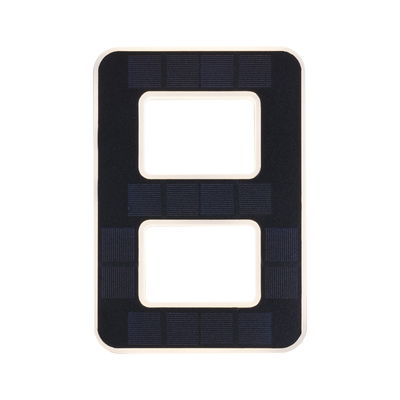 Rectangular black solar panel with two rectangular cutouts and white frame for LED lighting