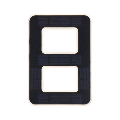 Rectangular black solar panel with two rectangular cutouts and white frame for LED lighting