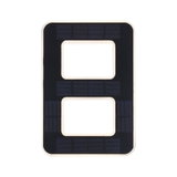 Rectangular black solar panel with two rectangular cutouts and white frame for LED lighting