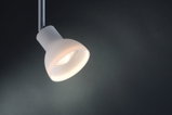 Modern white metal LED spotlight with adjustable head for focused lighting
