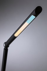 Black LED desk lamp with adjustable color temperature from warm white to cool white light