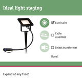 Black LED outdoor spotlight with ground spike and cable for garden lighting and light staging