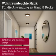 Wohnraumleuchte Malik mit schwarzem Rahmen und warmweißem Licht für Wand und Decke im modernen Design