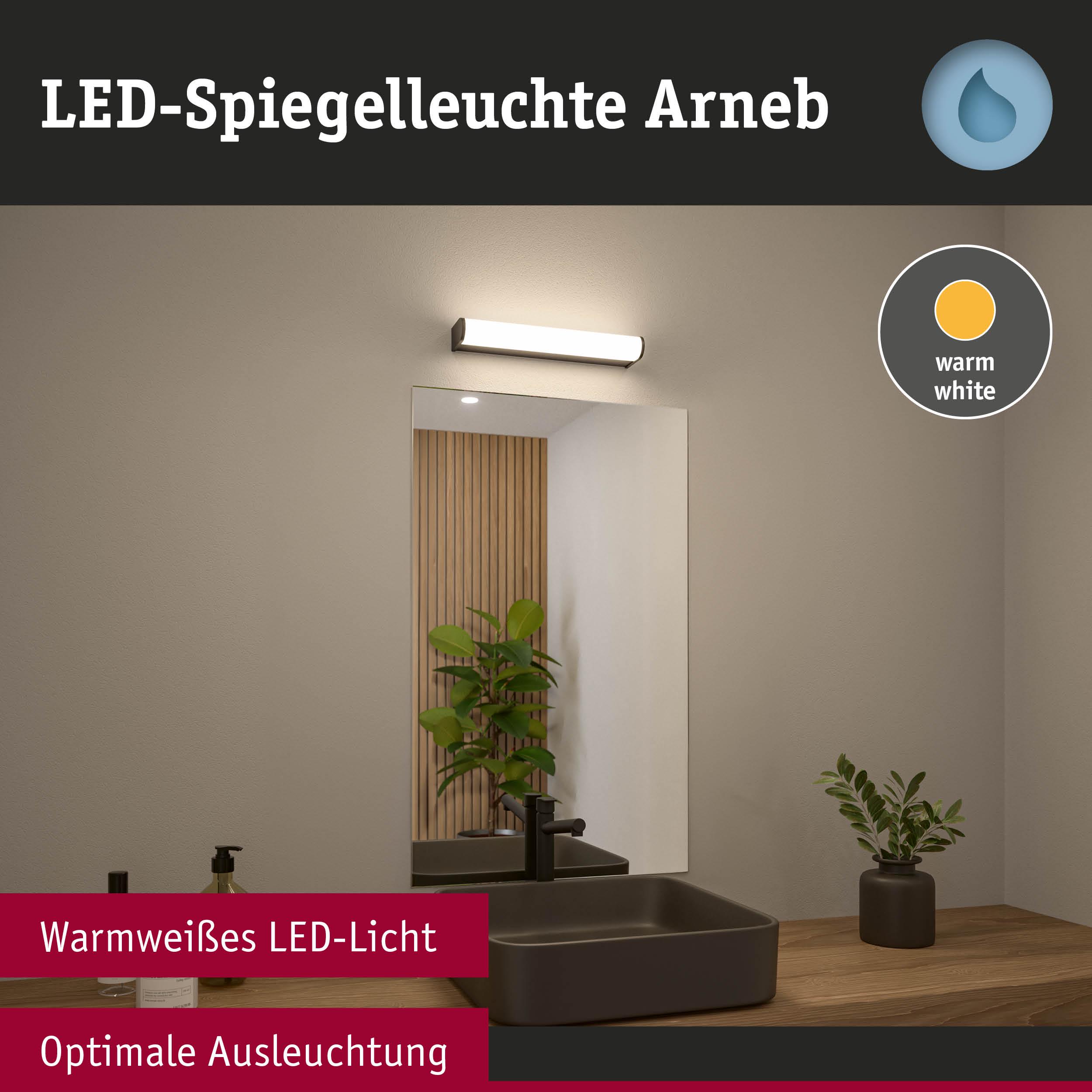 LED-Spiegelleuchte Arneb mit warmweißem Licht über Badspiegel und schwarzem Waschbecken