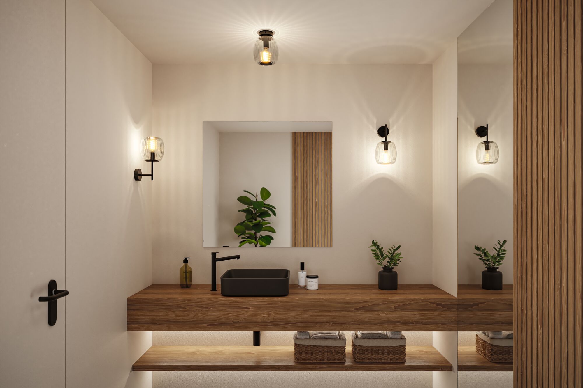 Modern bathroom with wooden vanity, black sink, and warm white glass wall lights for ambient lighting