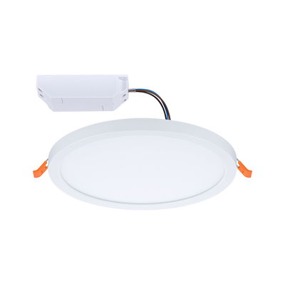 Round white LED recessed panel with driver and orange clips for ceiling lighting installation