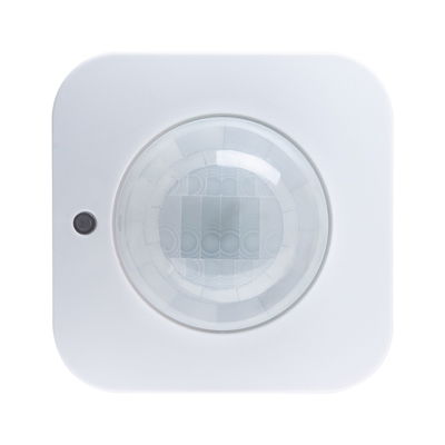 White square motion sensor with round lens for smart lighting control