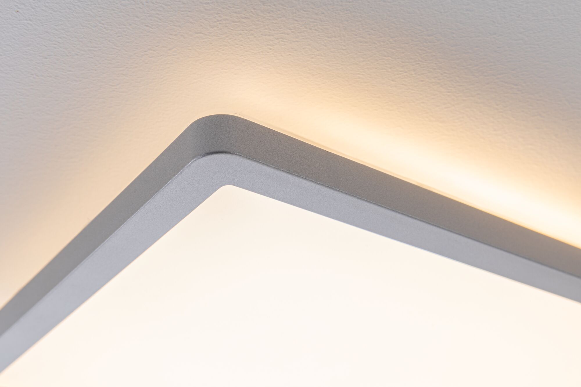 Square ceiling light with grey aluminium frame and warm white LED for modern interior lighting