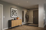 Modern hallway with warm white LED recessed lights in grey and wood tones for stylish lighting