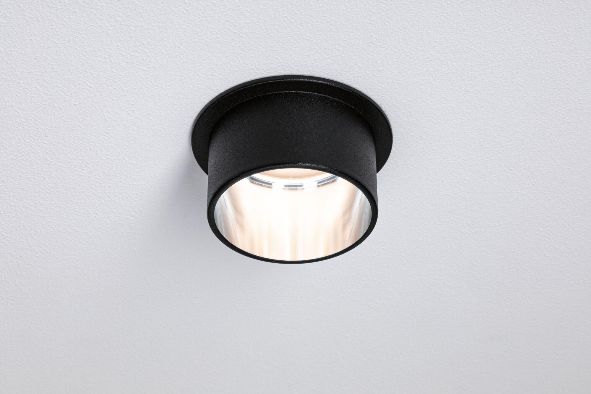 Black metal ceiling light with round design and warm white LED for modern interior lighting