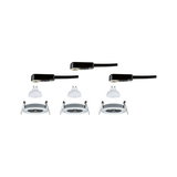 Drei weiße GU10 LED-Leuchtmittel mit Einbaurahmen und schwarzen Steckverbindern für Einbaustrahler