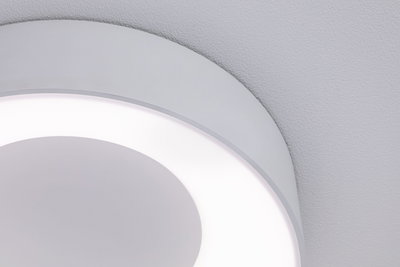 Round white LED ceiling light with diffuse illumination for modern home lighting