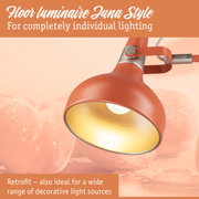 Orange metal wall lamp with gold interior for individual lighting and retro decorative light sources.