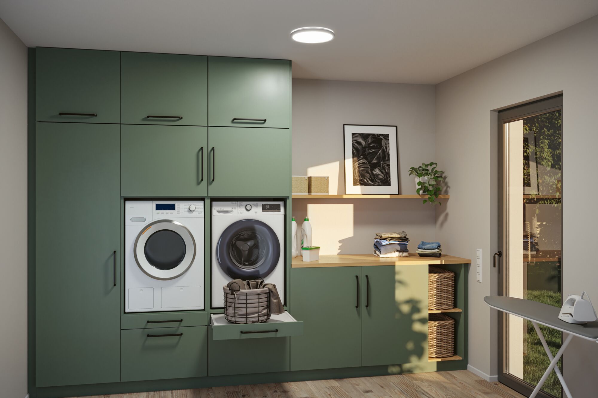 Modern green laundry room with built-in washer, dryer, and wooden countertop for laundry care.