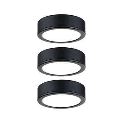 Trois plafonniers LED ronds noirs mats avec diffuseur blanc pour éclairage intérieur moderne