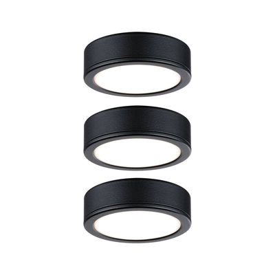 Trois plafonniers LED ronds en métal noir avec diffuseur blanc pour éclairage intérieur moderne