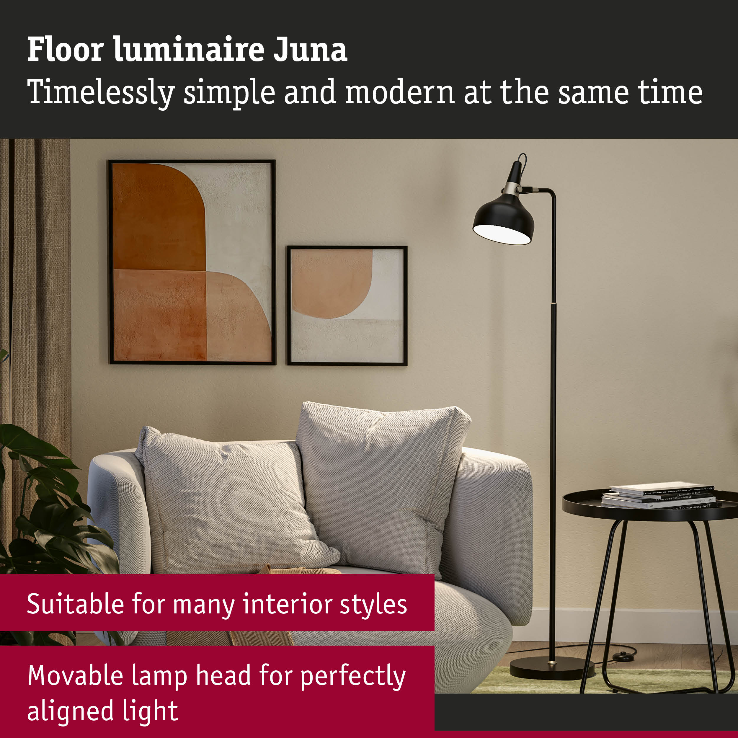 Black Juna floor lamp with adjustable head beside grey sofa and modern side table in living room