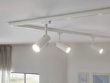 Drei weiße LED-Schienenstrahler an weißer Decke für moderne Raumbeleuchtung und Akzentlicht.