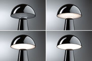 Vier Ansichten einer schwarzen Pilzlampe aus glänzendem Material mit weißem Diffusor und LED-Beleuchtung