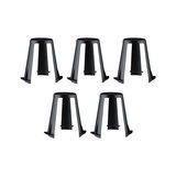 Set of five black plastic furniture feet with wide base and sturdy design