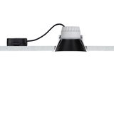 Black and white LED downlight installed in white ceiling with cable and driver for modern lighting solutions