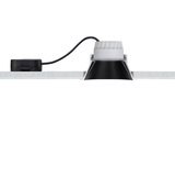 Zwart-witte LED-inbouwspot in wit plafond met kabel en driver voor moderne verlichting