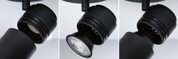 Black metal LED spotlight with adjustable head for versatile indoor lighting solutions