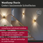 Wandlamp Tharin van goudkleurig metaal met instelbare lichteffecten, geschikt voor gangen en trappenhuizen