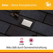 Solarbetriebene LED-Bodenleuchte in Schwarz auf dunklem Pflaster mit Ladezeit und Leuchtdauer