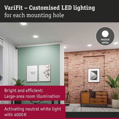 Modern living room with neutral white LED ceiling lights and brick wall for bright room illumination