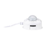 White plastic motion sensor with dome and cable for light control in smart lighting